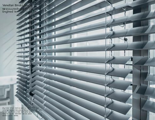 Close-up of horizontal blinds with sunlight filtering through.